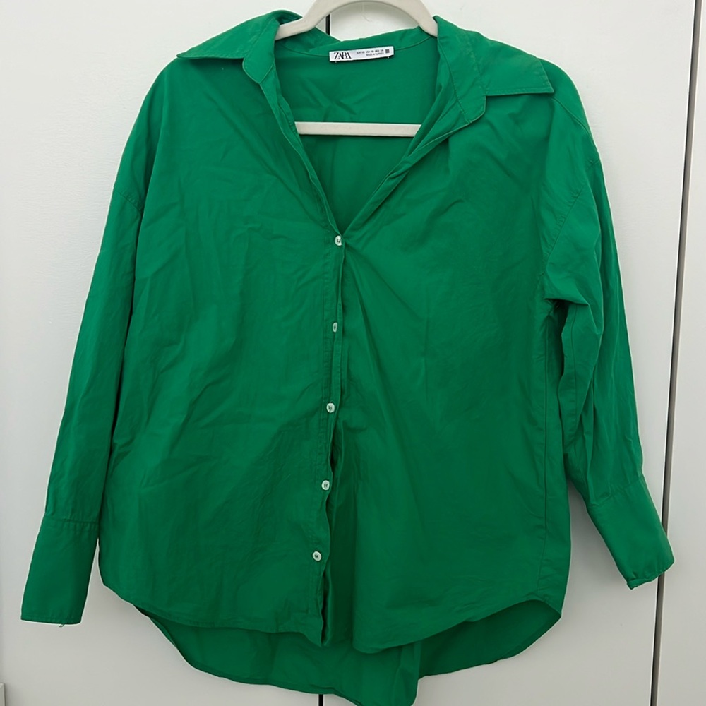 Green button down shirt